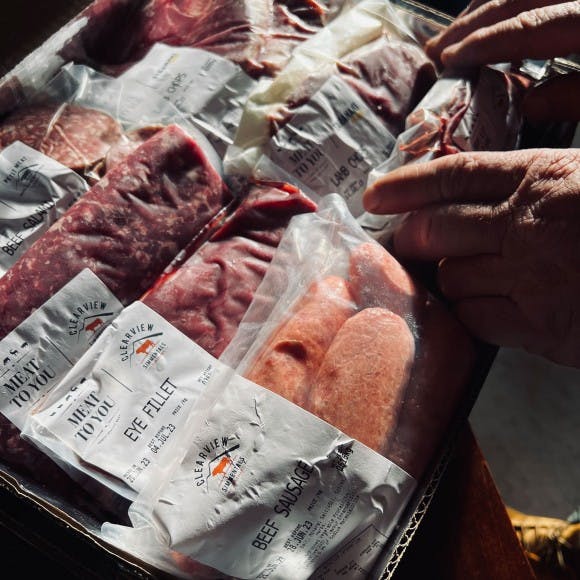 Butcher packing meat box